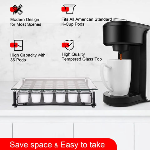 High Capacity Coffee Pod Drawer Organizer With Tempered Glass Top Holds 36 K Cup Pods next to coffee machine with mug.