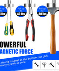 Extendable Telescoping Magnetic Pick Up Tool With 31 Inch Reach And Extra Strong Magnet For Quick Grabs In Tight Spaces, showcasing pull strength with tools