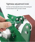 Portable Mini Electric Belt Sander Bench Grinder with adjustable tightness knob for precise sanding tension control.