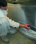 Person using Color Prep Scuff Pad For Auto Body And Paint Shop, Gray Hand Pad for fast scuffing on car door for color coat prep.