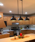 34 Inch Three Light Industrial Kitchen Island Pendant With Dome Shade Lighting Swivel Joints Brushed Nickel Finish Modern Farmhouse Style Chandelier For Kitchen Bar And Breakfast Nook Sleek And Functional in kitchen setting.