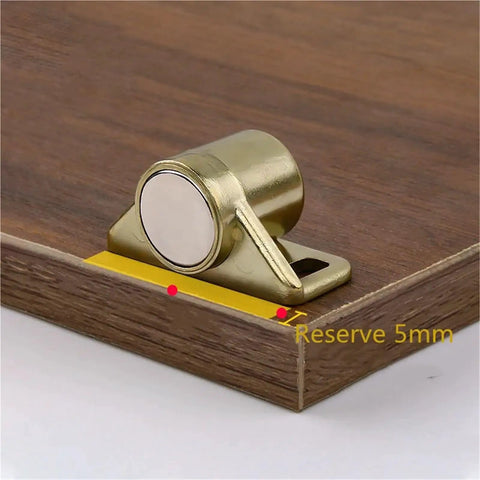 Heavy Duty Magnetic Door Cabinet Catch With Strong Suction Magnet For Wardrobes And Furniture Gold Finish One Piece Easy Install Secure Latch Clasp No Tools Required on wood surface