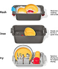 Outdoor Camp Kitchen Wash Dry And Stow System with two bins and a drying rack illustrated in use