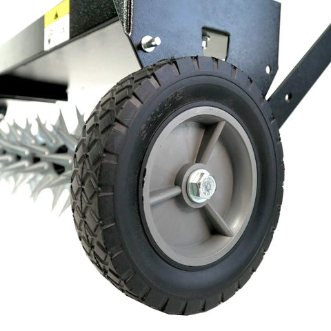 Close-up of wheel and spikes on Tow Behind Spike Aerator With Transport Wheels, 40-Inch Lawn Aerator, galvanized carbon steel.