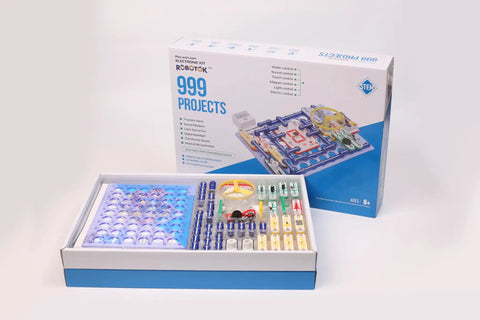 Ultimate STEM Electronics Kit For Kids Ages 8 And Up With 999 Projects In One Mega Circuit Set Includes 64 Components And Full Color Step By Step Manuals For Hands On Experiments Without Soldering Learn Physics And Electronics At Home open box with circuit parts
