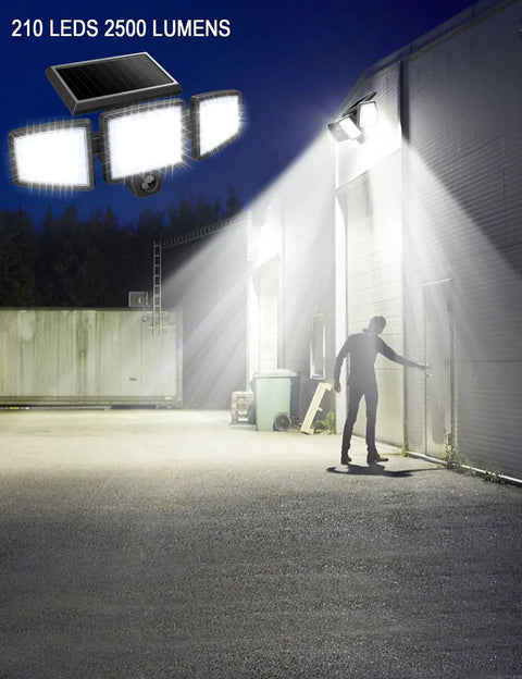 Solar Flood Lights With Motion Sensor, 210 LED 2500LM 6500K, illuminating outdoor area with silhouette at night