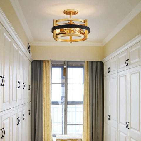 Elegant gold and black ceiling light fixture in a modern room setting