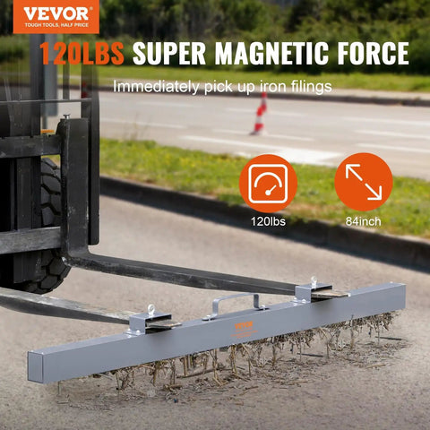 Hanging Magnetic Sweeper Pickup Tool for Nails Bolts Iron Chips Metal Scraps 120 lb Capacity attached to forklift outdoors.