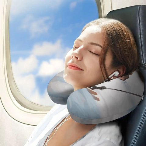 Woman using Skiing Squirrel Travel Pillow for Neck Support U Shaped Napping Cushion on flight