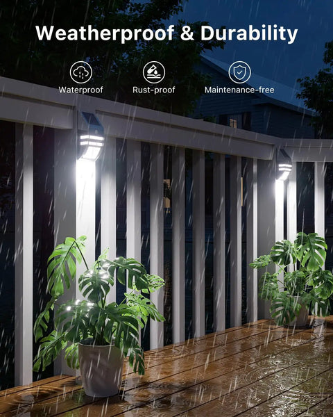 4 Pack Solar Wall Lights Outdoor Stainless Steel Motion Sensor Lamps Waterproof lighting a rainy deck with plants