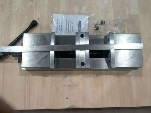 Six Inch Double Lock Cnc Machine Vise With Hardened Steel Bed And Reversible Step Jaws For Heavy Duty Fabrication, top view on wooden surface.