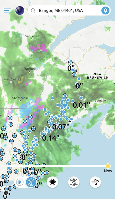 Weather map showing precipitation data over New Brunswick region, Canada, with various rain measurements in blue and green.