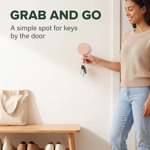 15 Pack Self Adhesive Wall Hooks With Hella Strong Grip No Drilling Damage Free Mounting For Towels Keys And Flatware Decorative Cutesy Style Perfect For Bathroom Office Or Closet Super Easy Setup And A Surefire Storage Winner in use with keys on wall.
