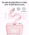 Durable Braided Built-In Cable with 10000 Bend Cycles on a pink power bank, size 5.98 in, stain-resistant, for reliable charging.