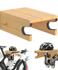 Wood Bike Wall Mount With Shelf And Hooks, All In One Road Bike Storage Rack displaying helmet, shoes, and goggles on wall-mounted wood shelf