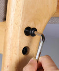 M6 X 12Mm Socket Cap Screws 100 Pack 10 Point 9 Grade Alloy Steel being installed with hex wrench into wooden furniture.