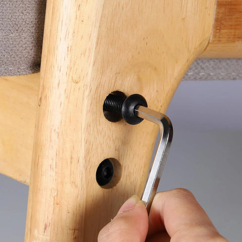 M6 X 12Mm Socket Cap Screws 100 Pack 10 Point 9 Grade Alloy Steel being installed with hex wrench into wooden furniture.