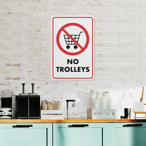 No Trolley Symbol 8 By 12 Warehouse Equipment Restriction Sign on indoor brick wall with kitchen items below