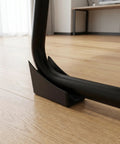 Close-up of 10 Pack U Shaped Chair Leg Pads With Screws For Hardwood Floors And Office Chairs on wooden floor
