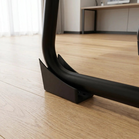 Close-up of U Shaped Chair Leg Protector 10 Pack Thick No Slip Rubber Pads on office chair leg on hardwood floor.