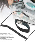 Adjustable Anti Static Wrist Strap ESD Bracelet For Electronics Repair And Phone Fixes On The Job with tools in background.