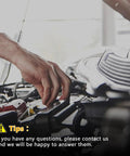Mechanic hand working on car engine, indicating maintenance or repair process.
