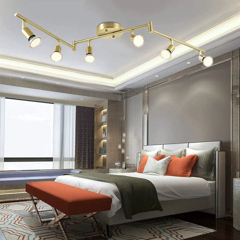 6 Light LED Track Lighting Kit In Gold With Rotatable Heads in modern bedroom setup, ceiling installation view