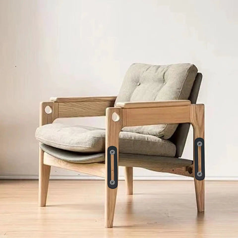 Upgrade Your Woodwork Game With These Hella Sturdy Adjustable Flat Mending Plates Featuring Slotted Black Stainless Steel Straight Brace Brackets For Reliable Furniture Repair Including All Mounting Screws on a wooden chair.