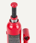 Amazon Basics red hydraulic bottle jack with black threaded lift rod and knurled red top, front view