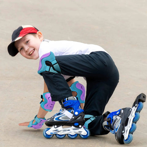 Child wearing Kickin Safe Kids Protective Gear Set Knee Pads Elbow Pads Wrist Guards for Roller Skating on pavement