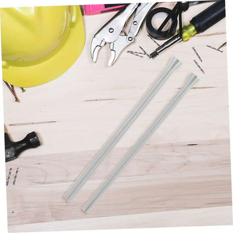 Parliky 2 Piece Tubing Bender Set Hand Benders For Copper Pipes And Wire Easy Use Plumbing Electrical Tasks Durable Flexible Spring Tool, shown on toolbox.