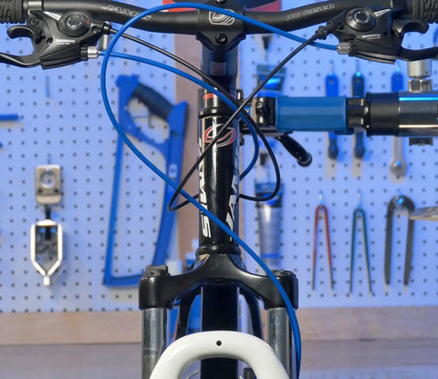 Front view of bike with Ready To Roll Universal Bike Shift Cable Housing Kit for Shimano Sram Derailleur Shifter Set.