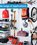 Organized garage with Heavy Duty Steel Wall Mount Hooks For Garage And Garden Tool Organization, holding bike and sports gear.