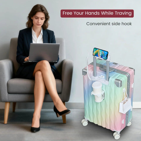 Woman using laptop next to Go To 20 Inch Carry On Luggage With Spinner Wheels And USB Port, featuring colorful finish.