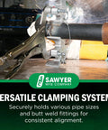 Sawyer Welders 3rd Hand portable pipe welding clamp gripping a steel pipe for butt welds (side view)