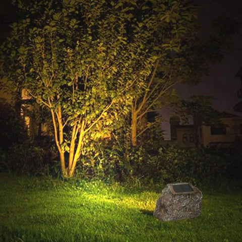 Solar Powered Rock Lights Outdoor Dope 2 Pack With 10 LED Waterproof Stones illuminating garden at night