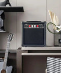 20W Electric Guitar Amplifier With Built In Speaker, Headphone Jack, Aux Input, Drive Button, and Controls on Desk