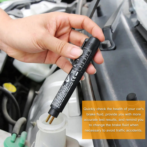 Person using Brake Fluid Tester Pen With 5 LED Indicators For DOT3 DOT4 DOT5.1 Testing, Quick Moisture Check For Car Maintenance