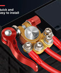 Beefy Pure Copper Battery Terminal Connectors 4 Way Quick Release 1 Pair installed on battery post showing red cables and quick-release lever.