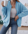 Woman wearing Trendy Long Sleeve Full Zip Sweatshirt Bomber Jackets For Teen Girls Blue Lightweight Soft And Stretchy Loose Fit Size Small