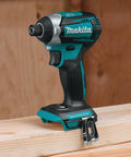 18V LXT Brushless Cordless Impact Driver with Quick-Shift Mode, Tool Only, displayed on a wooden surface for heavy duty projects.