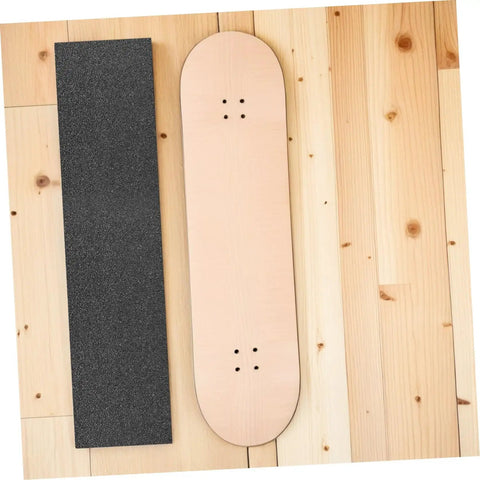 Non Slip Grip Tape For Skateboard Decks And Electric Scooters Heavy Duty PVC Material next to a skateboard deck on wood floor.