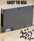Top Shelf Thirty Piece Replacement Kit For Ridge And Minimalist Metal Wallets With Bonded Threadlocker T5 Torx And Hex Driver To Keep It Secure On The Daily Grind with screws and driver on wallet.