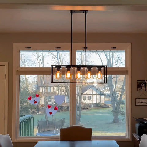 Black Farmhouse Style 5-Light Rectangle Chandelier With Glass Shades over a dining table, modern rustic vibe, 30x10 inch