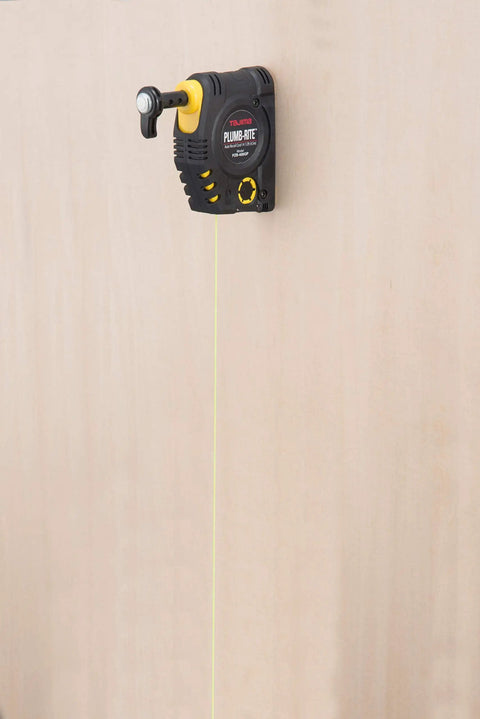 Magnetic Plumb Bob Setter 14 Ounce With Quick Stabilization Self Retracting 14.5 Foot Line on Wooden Surface