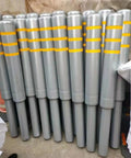 No Sweat Installation Heavy Duty Steel Safety Bollard Pour In Place Post With Vivid Reflective Strips stacked in a group.