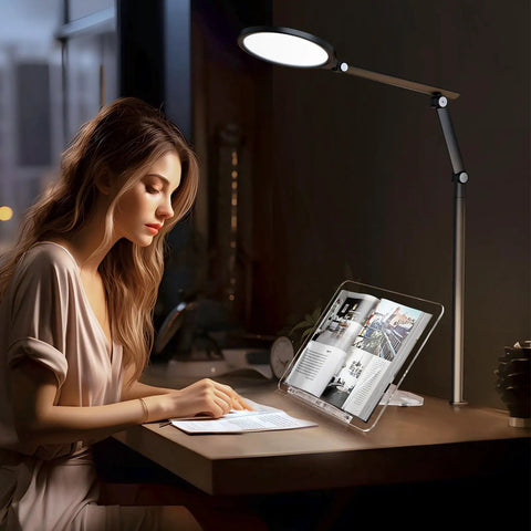 Clear Acrylic Book Stand With Adjustable Angle, Foldable Cookbook And Laptop Display Holder on desk with lamp