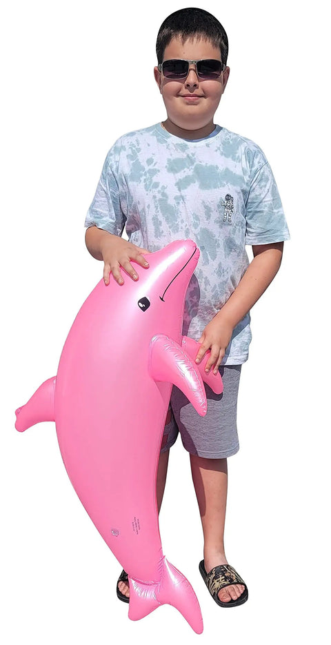 Child holding a Massive 40 Inch Pearlized Dolphin Inflatable Pool Toy For Beach And Poolside Fun Pink 3 Pack Centerpiece Decor For Birthday Parties Buffets And Aquatic Themed Celebrations.