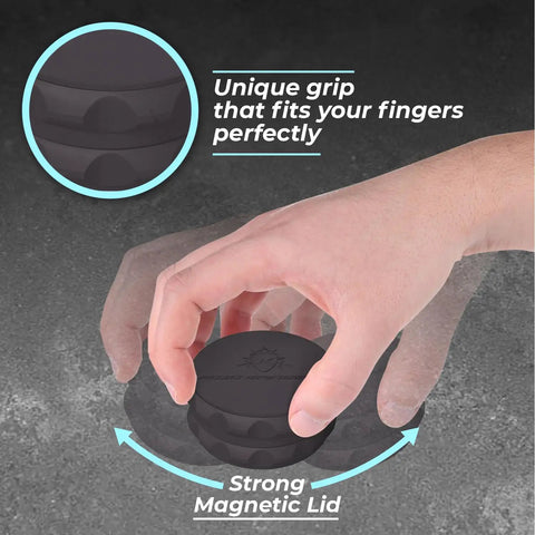 Hand holding 2.5 Inch Spice Grinder, 2 Piece With Strong Grip And Magnetic Lid on a textured surface, demonstrating easy twist operation.