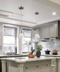 Modern kitchen with Dope Handblown Seeded Glass Pendant Light With Brushed Nickel Finish One Light Industrial Mini Pendant over island